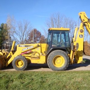 2000 JOHN DEERE 710D Backhoe Loader